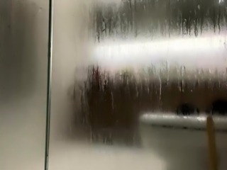 Hot teen plays with a dildo and sucks a cock in the shower