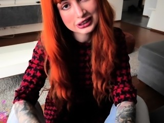 Beautiful redhead uses toy to masturbate