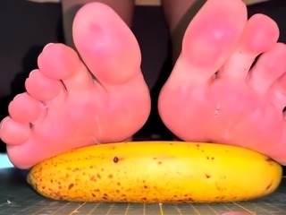 Brunette with foot fetish rubs big dick with her feet in POV