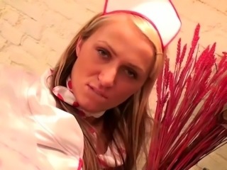 Hot blonde nurse shoves a huge pole in her ass