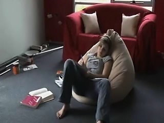 Perverted brunette teen jerks while watching porn